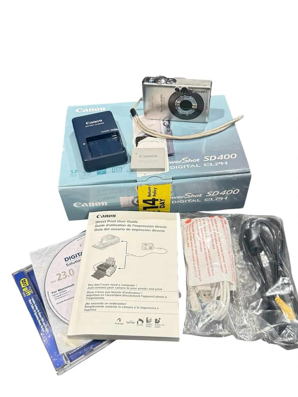 Canon PowerShot SD400 digital camera working + box + charger + cords